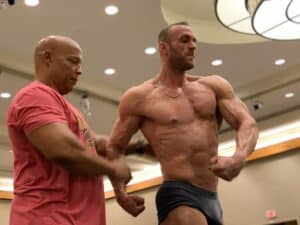 Shawn Ray helping posing